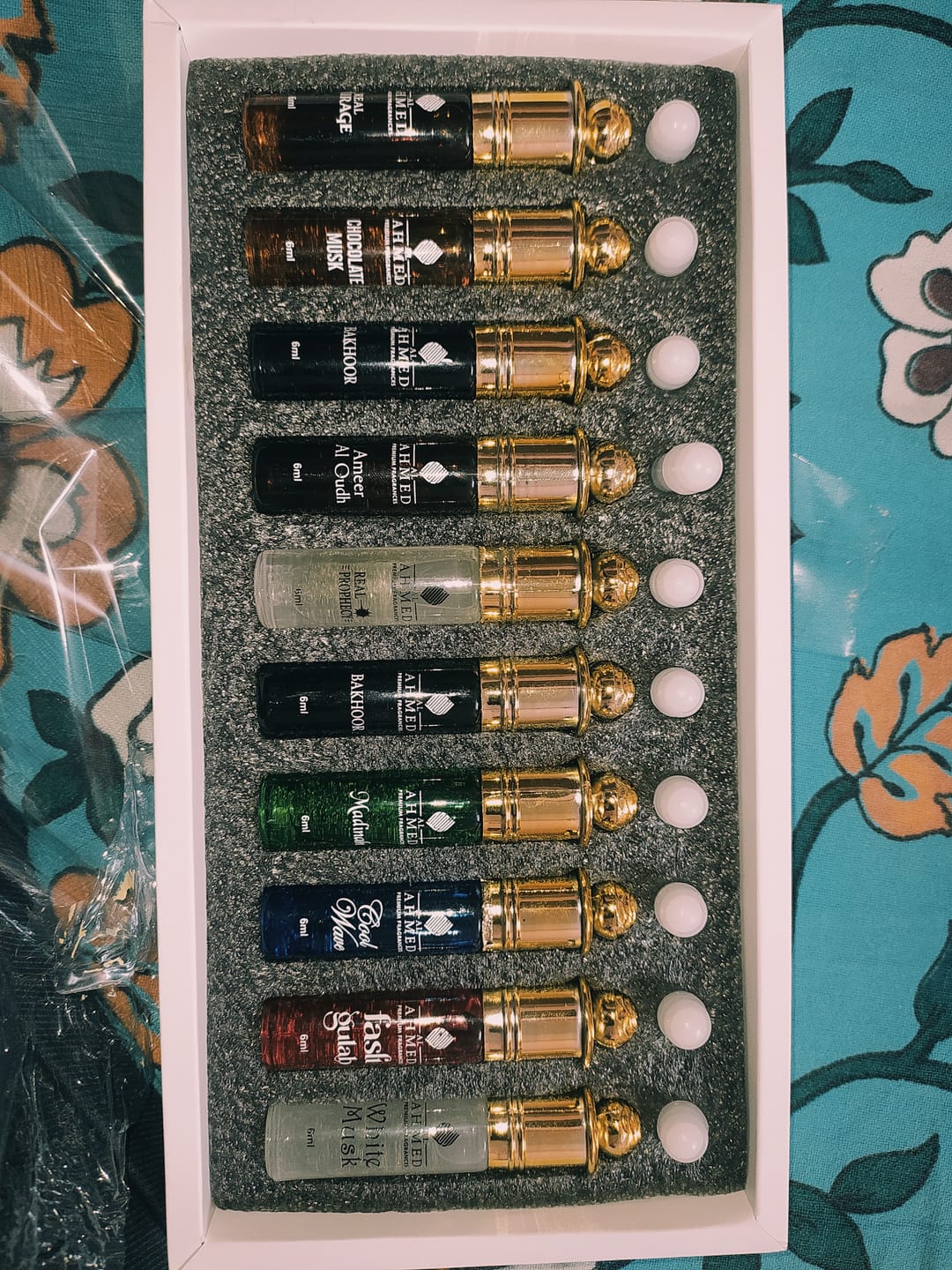 Customer photo review of Al Ahmed 10 PCS Aura Attar Collection | 6ml Each | Alcohol-Free Concentrated Perfume Oil | Long-Lasting Unisex Attar Gift Set for Men & Women | Premium Fragrance Combo