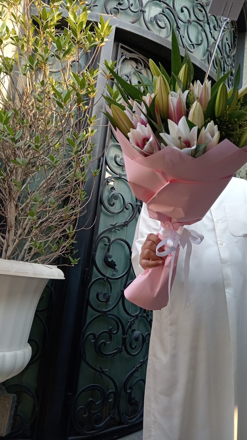Customer photo review of 10 Elegant Pink Lily Bouquet