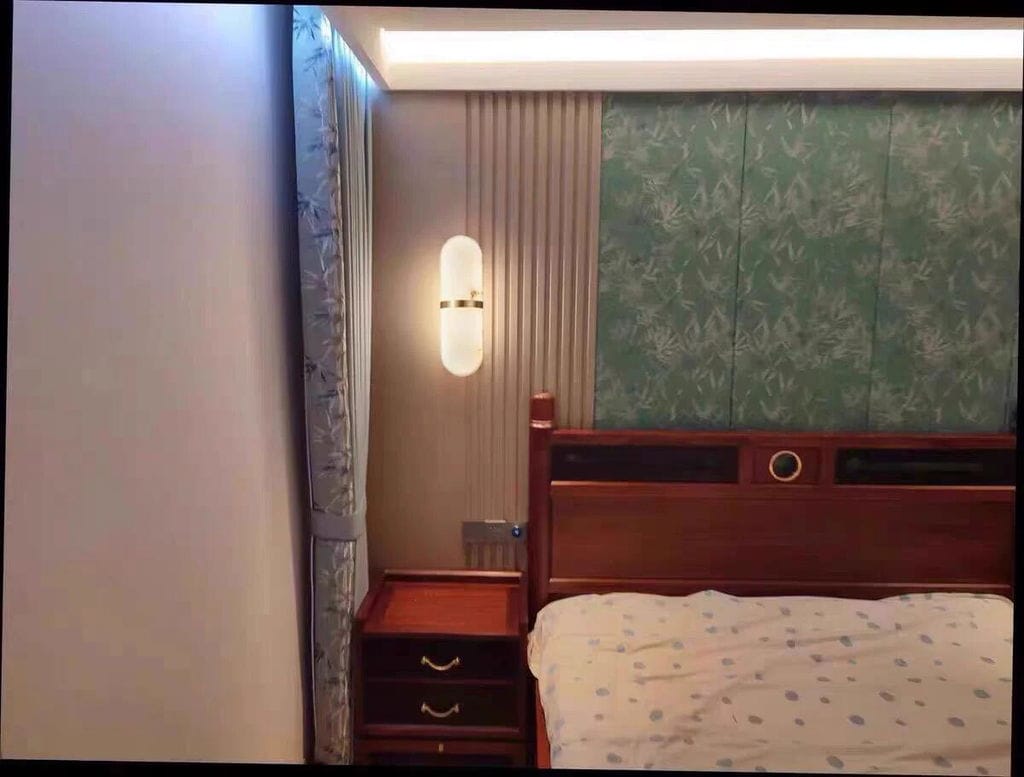 Customer photo review of Pill-Shaped Wall Sconce for Hallway, Alabaster, Brass