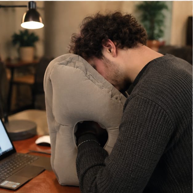 Customer photo review of HushBound Travel Pillow – Real Sleep Sitting Up, Inflates in Seconds