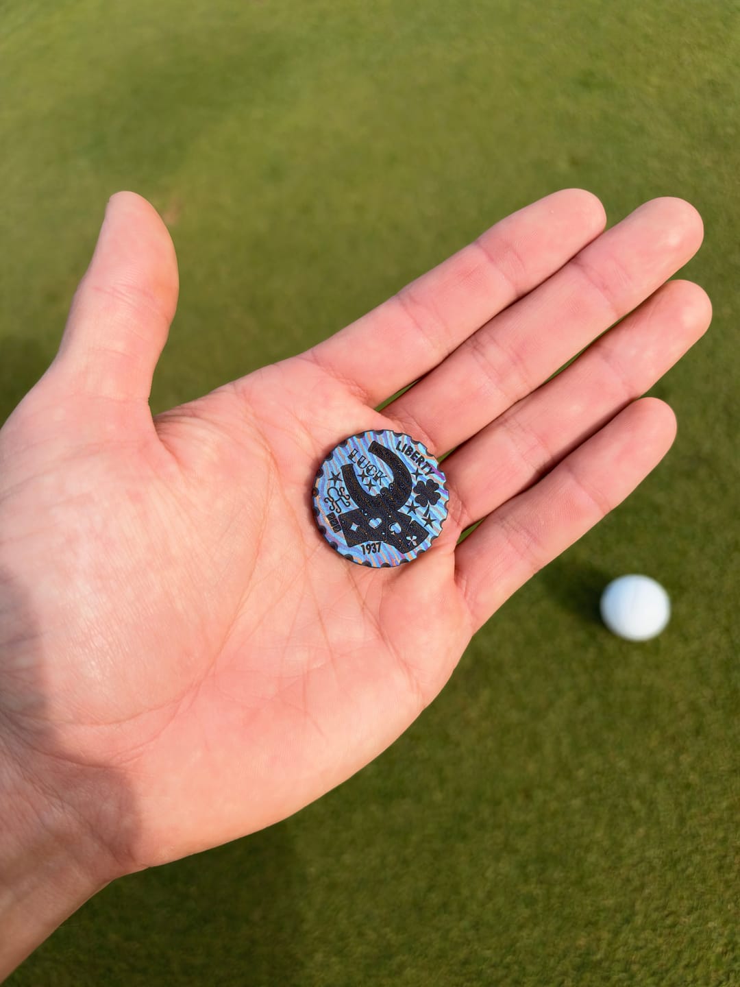 Customer photo review of HOBO LUCK GOLF BALL MARKER - TIMASCUS EDITION