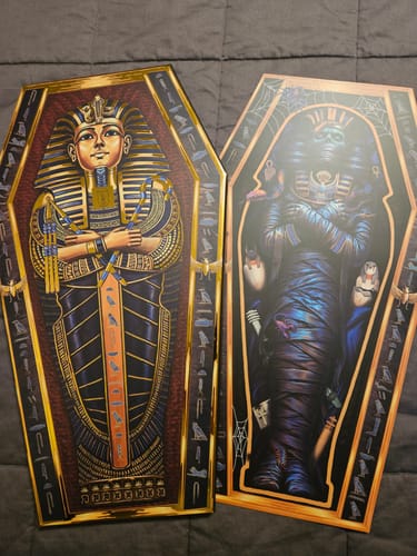Customer's Coffin Collection 2026 showing two detailed sarcophagus-themed boxes side by side.