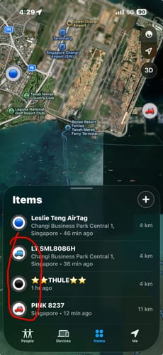 Customer's Apple Find My app screen highlighting tracked items, including the Spotminders Tracking Card location.