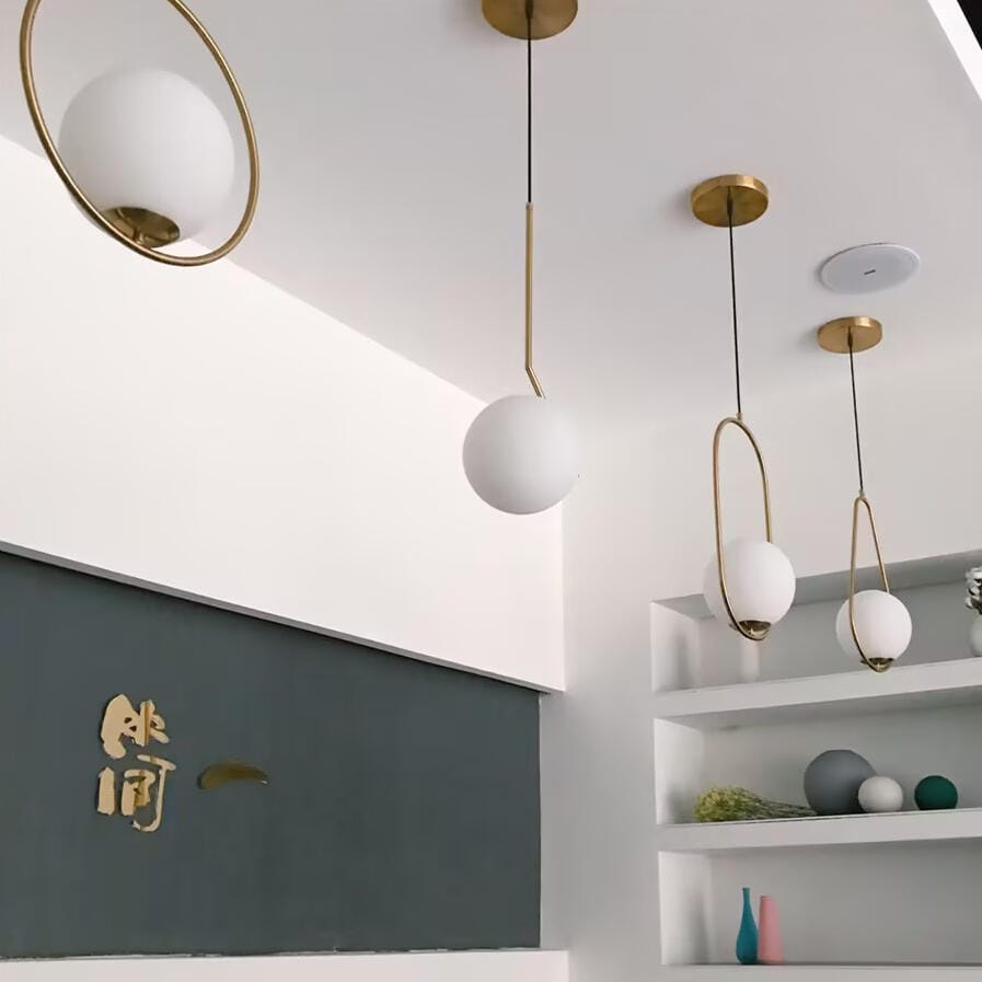 Customer photo review of Globe Pendant Light, White Glass, Brass or Black Stem, 20 cm