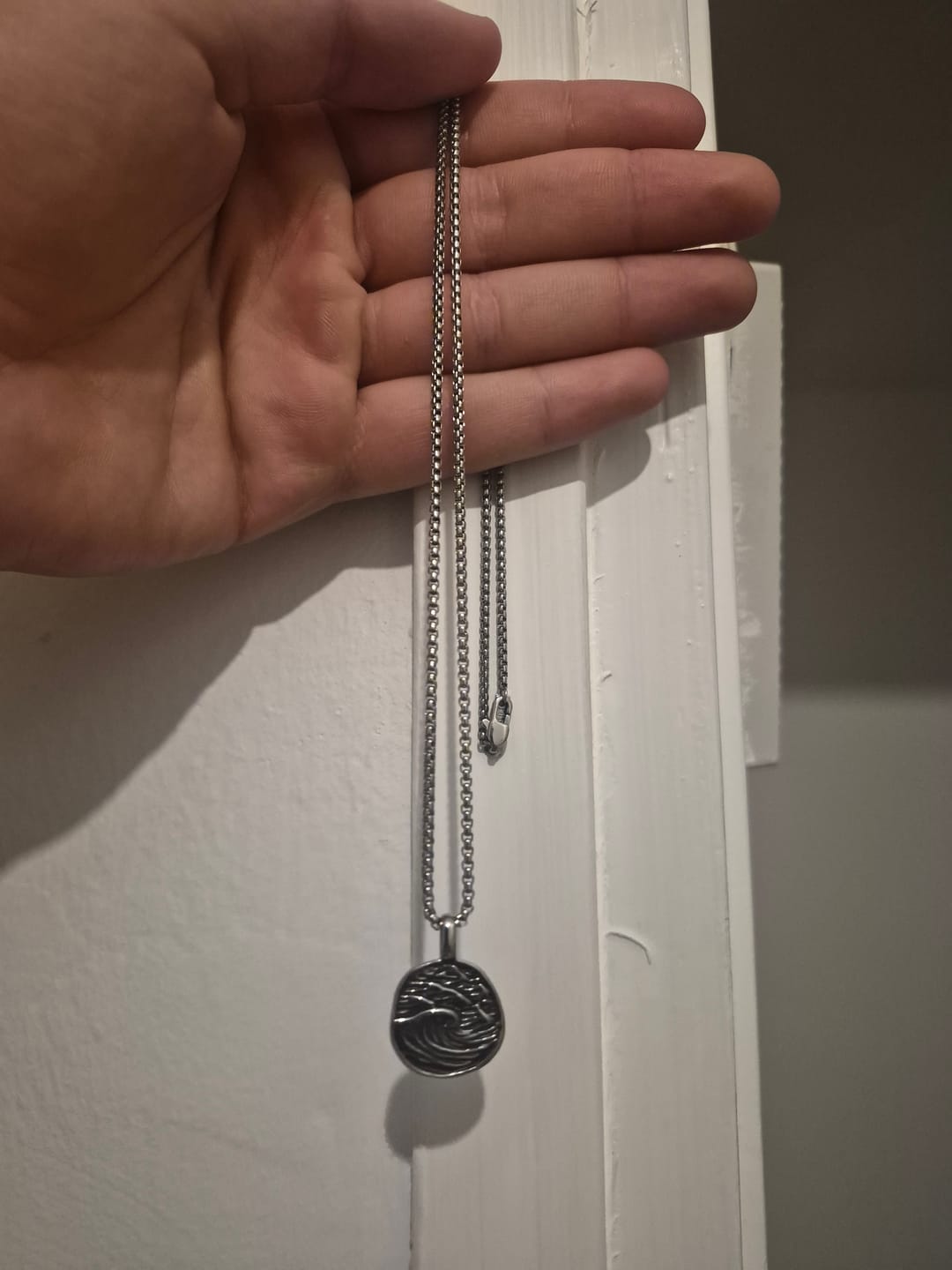 Customer photo review of Jeffreys Bay Wave Necklace