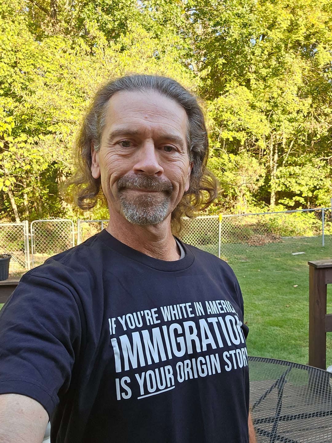 Customer photo review of If you're white in America, IMMIGRATION is your origin story Unisex Tee