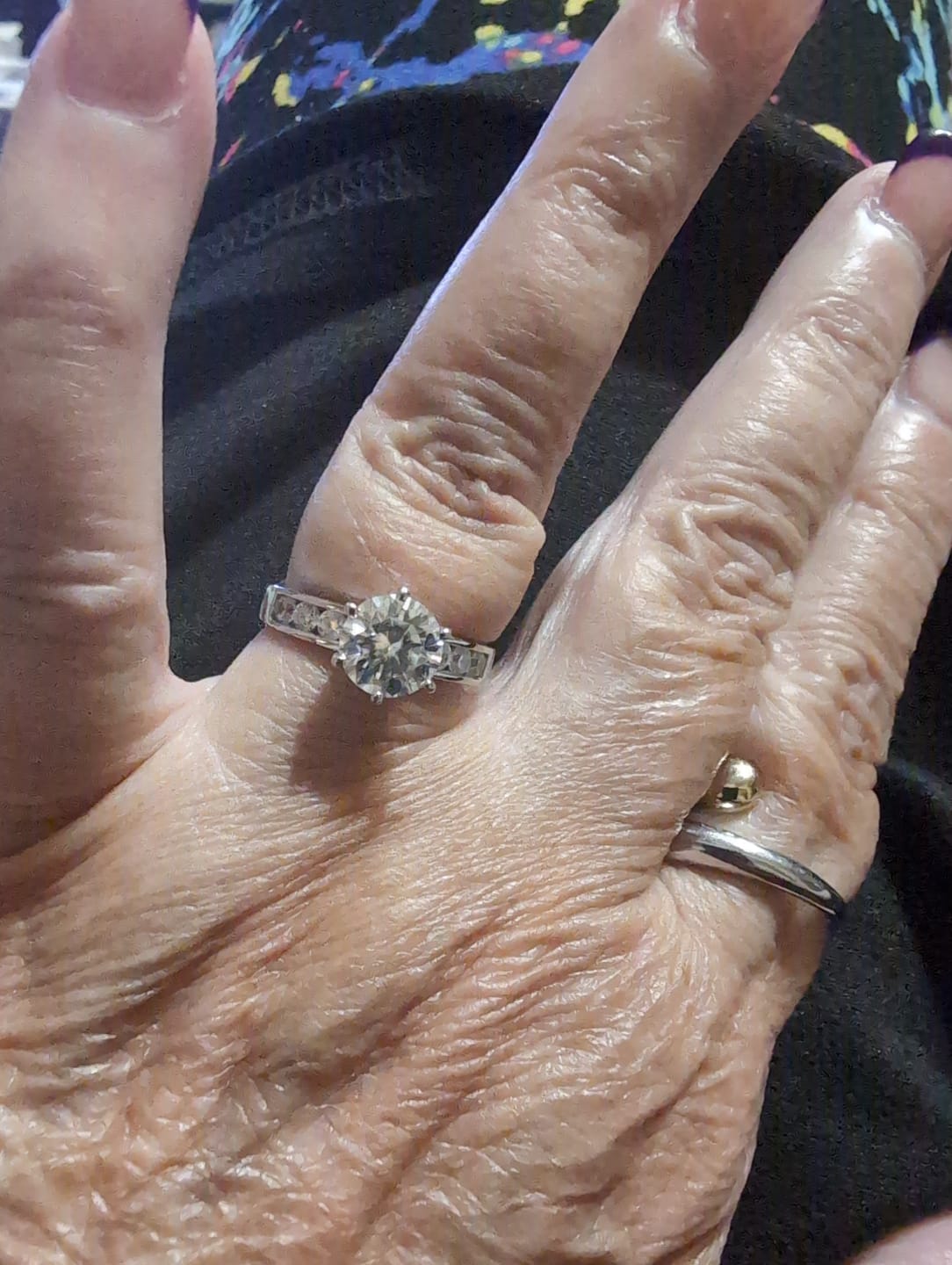 Customer photo review of Round Cut Moissanite Channel Set Engagement Ring