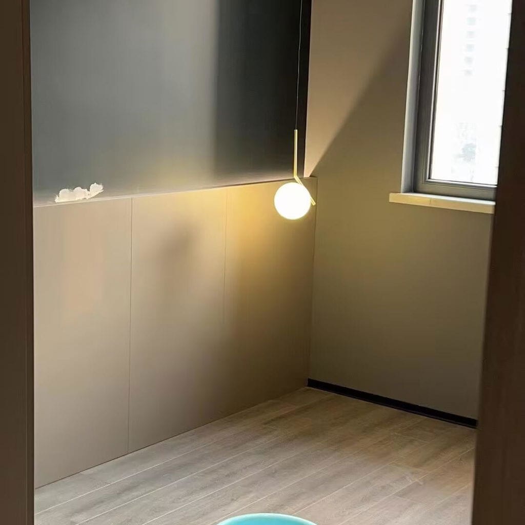 Customer photo review of Globe Pendant Light, White Glass, Brass or Black Stem, 20 cm