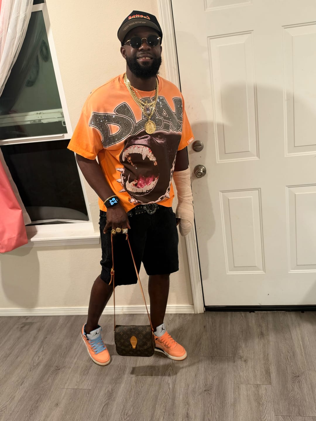 Customer photo review of DJ Khaled x Air Jordan 5 Retro 'We The Best - Crimson Bliss'