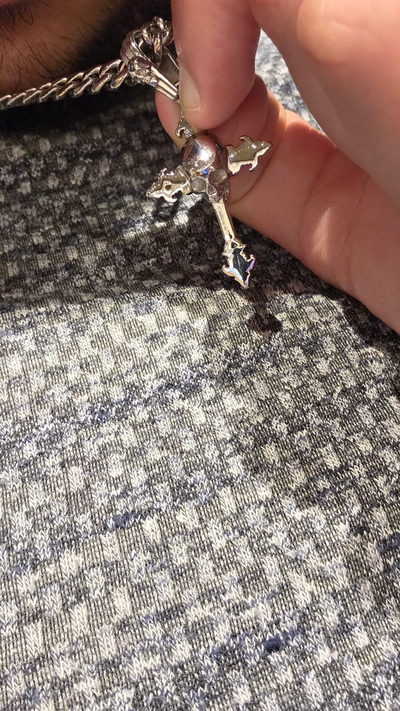 Customer photo review of DOWN YOUR THROAT PENDANT