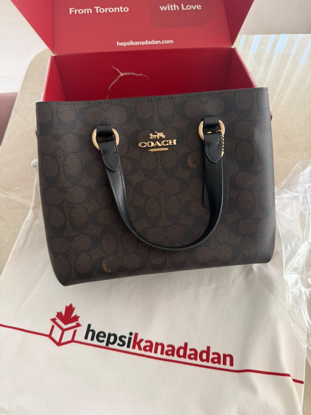 Customer photo review of Coach Women's Station Carryall Bag In Signature Canvas Gold/Walnut/Black