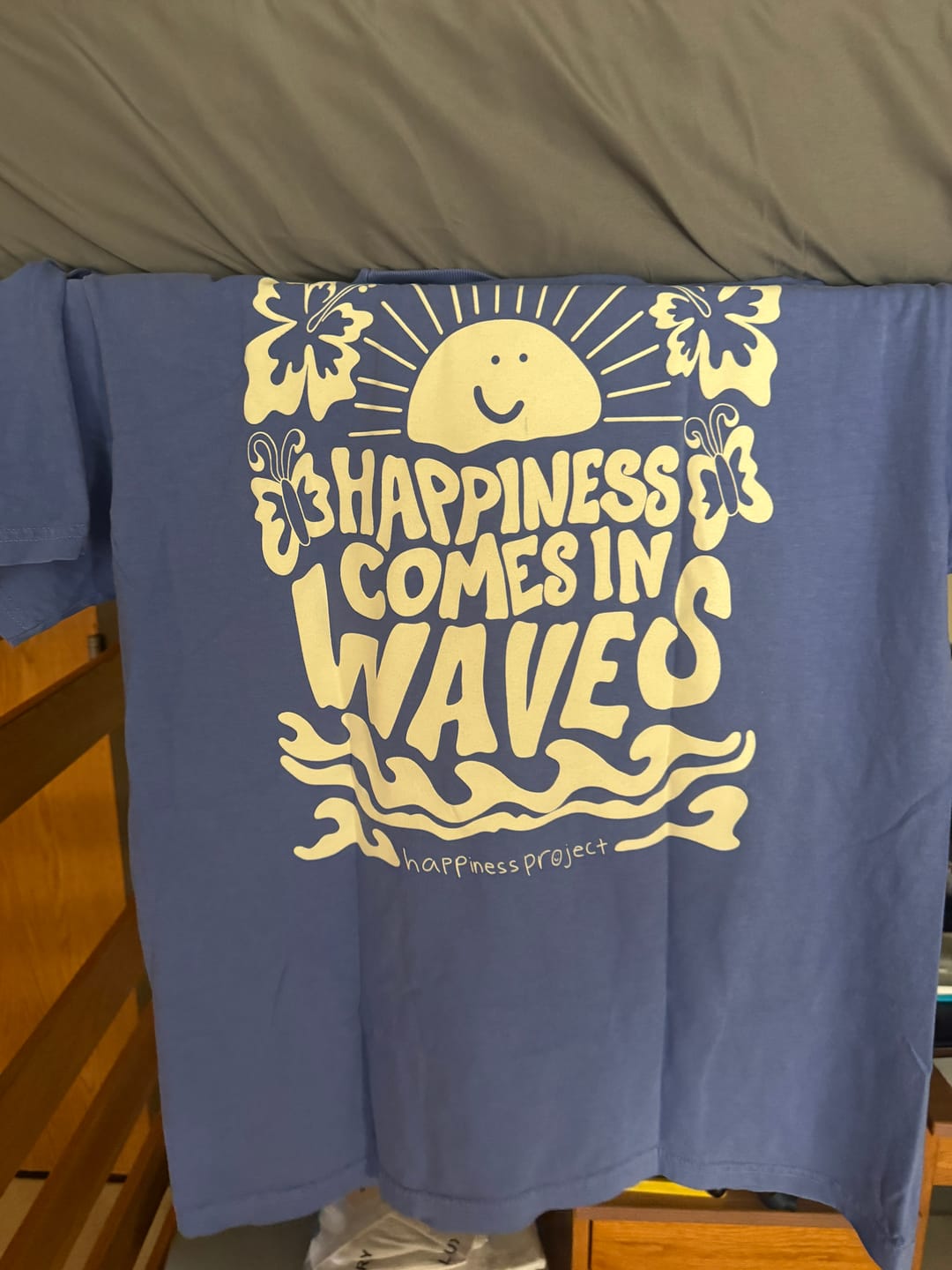 Customer photo review of Happiness Comes in Waves T-Shirt - Ocean Blue