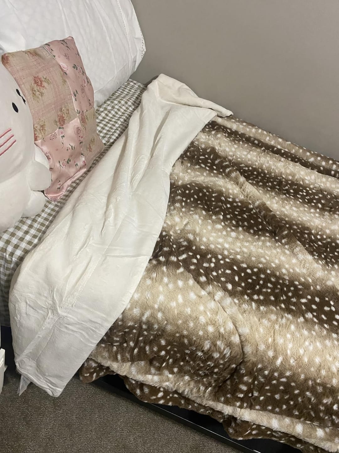 Customer photo review of Faux Fur Deer Blanket