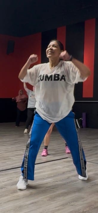 Customer photo review of Zumba Basic Oversized Mesh V-Neck Top - Black