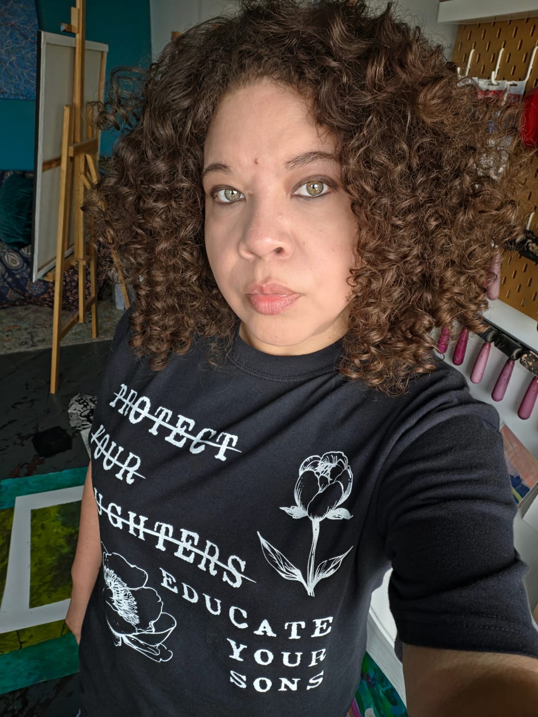 Customer photo review of Protect Your Daughters Educate Your Sons Tee