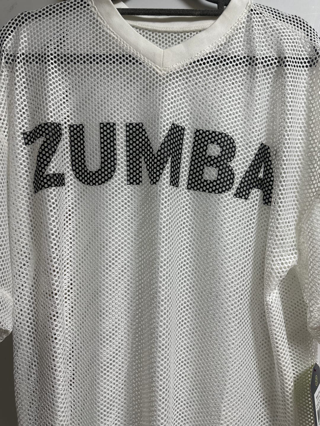 Customer photo review of Zumba Basic Oversized Mesh V-Neck Top - Black