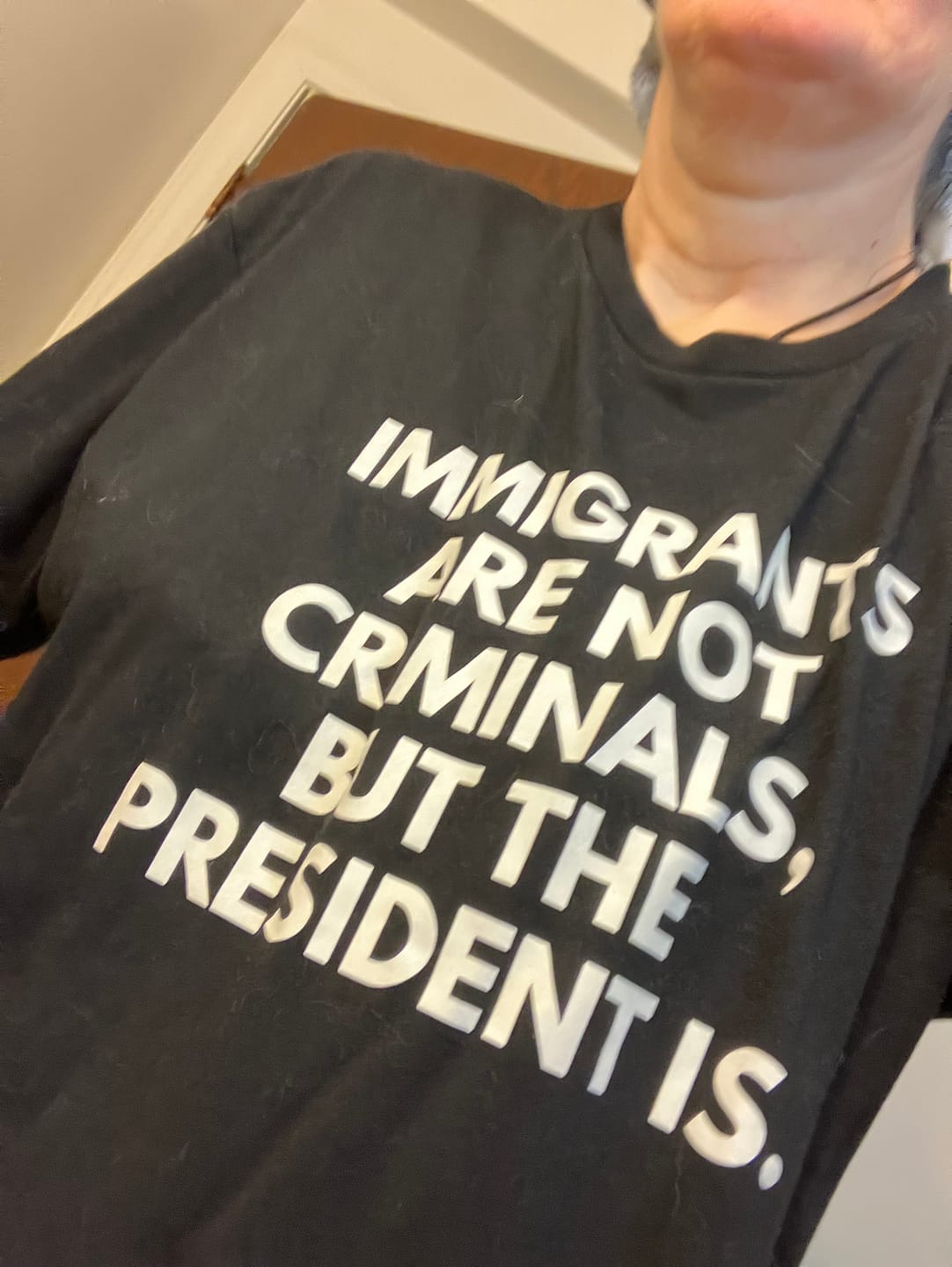 Customer photo review of Immigrants Front English and Back Spanish Unisex T-Shirt