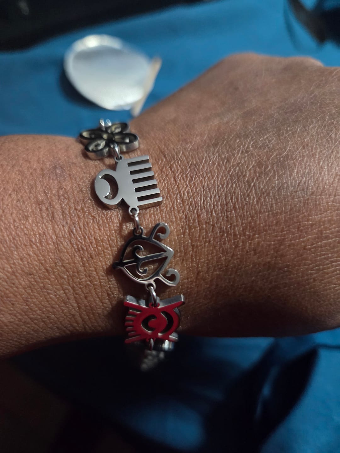 Customer photo review of The Adinkra Legacy Set — Necklace + Bracelet + Gye Nyame Studs