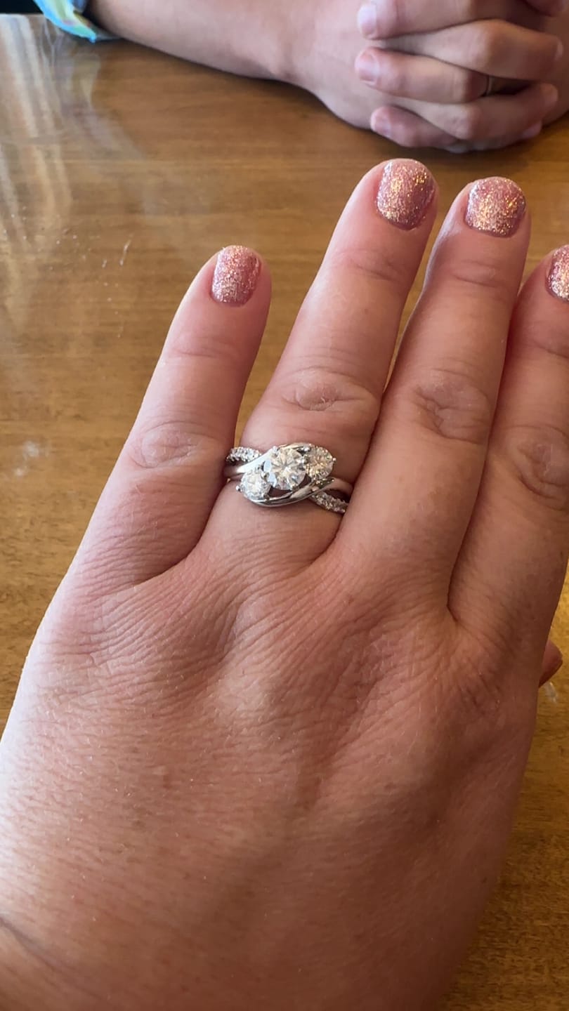 Customer photo review of Swirl Three Stone Moissanite Twisted Pave Engagement Ring
