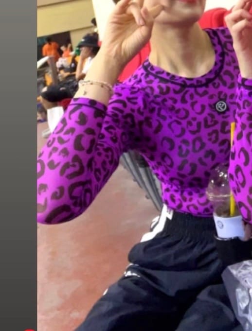 Customer photo review of Ultrabright Long Sleeve Mesh Crop Top - Cheetah