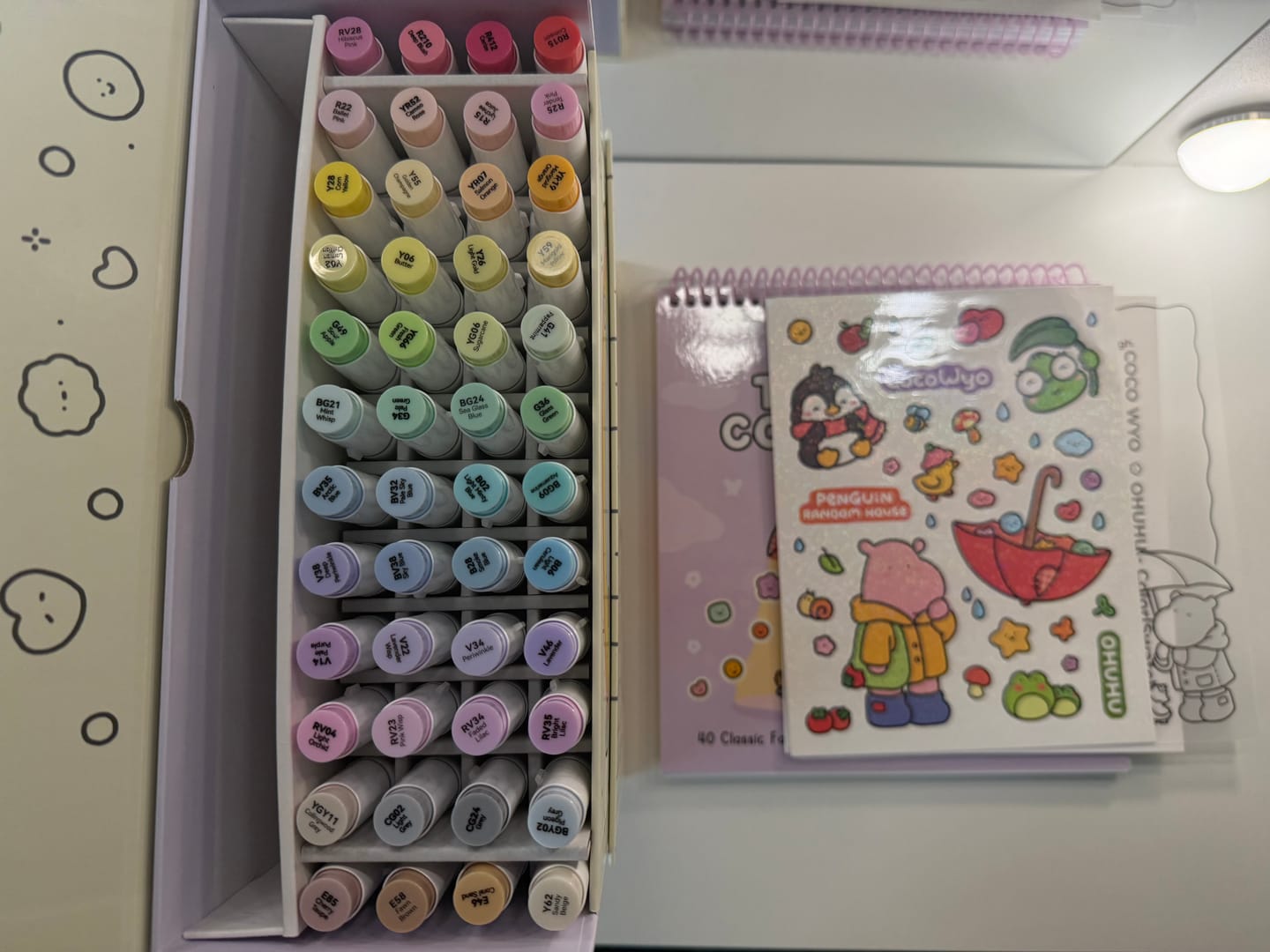 Customer photo review of Ohuhu x Coco Wyo Cozy Mood Coloring Kit, Honolulu B 48 Colors Alcohol Markers with Brush & Fine Dual Tips, Coloring Book with Mood Tracker Pages