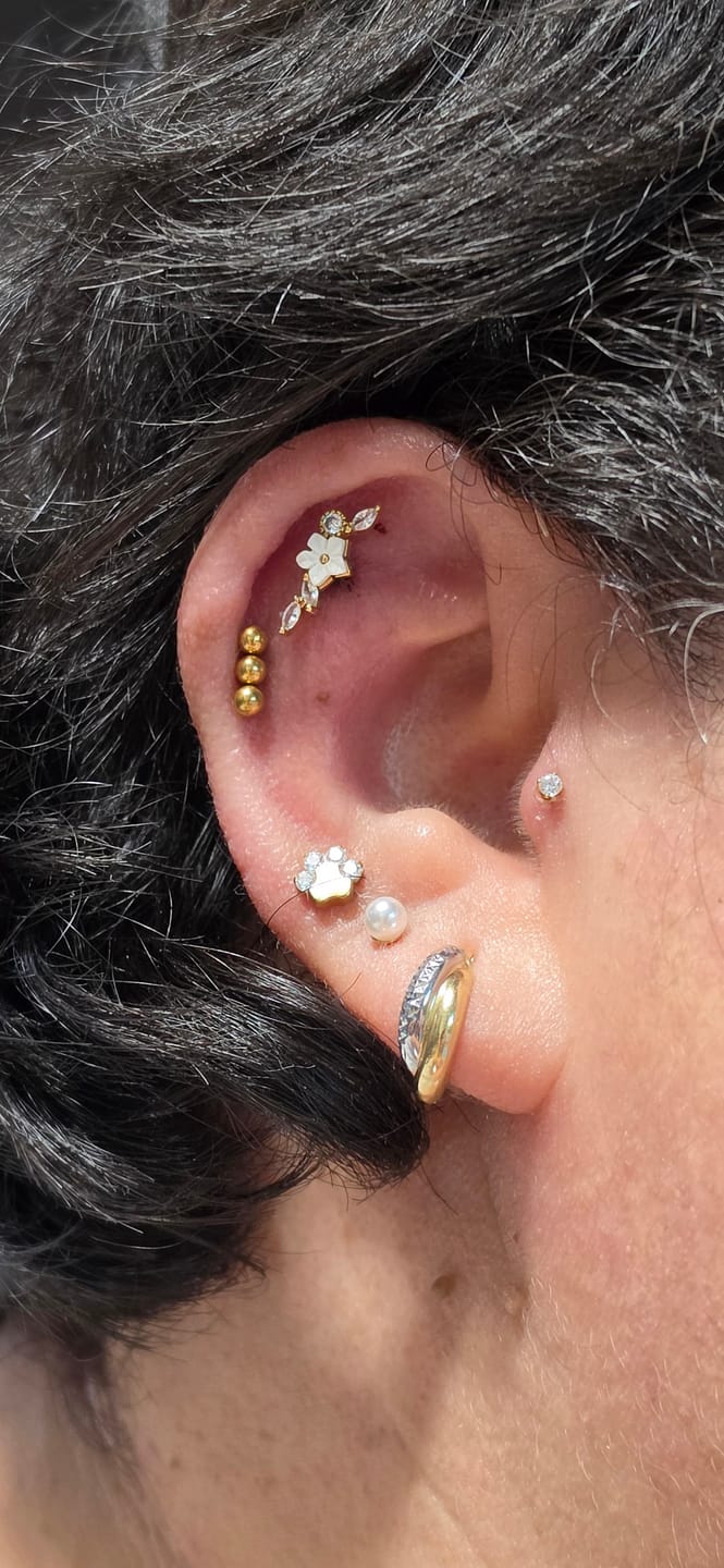 Customer photo review of Piercing Huellita 1ra Perforación Titanio