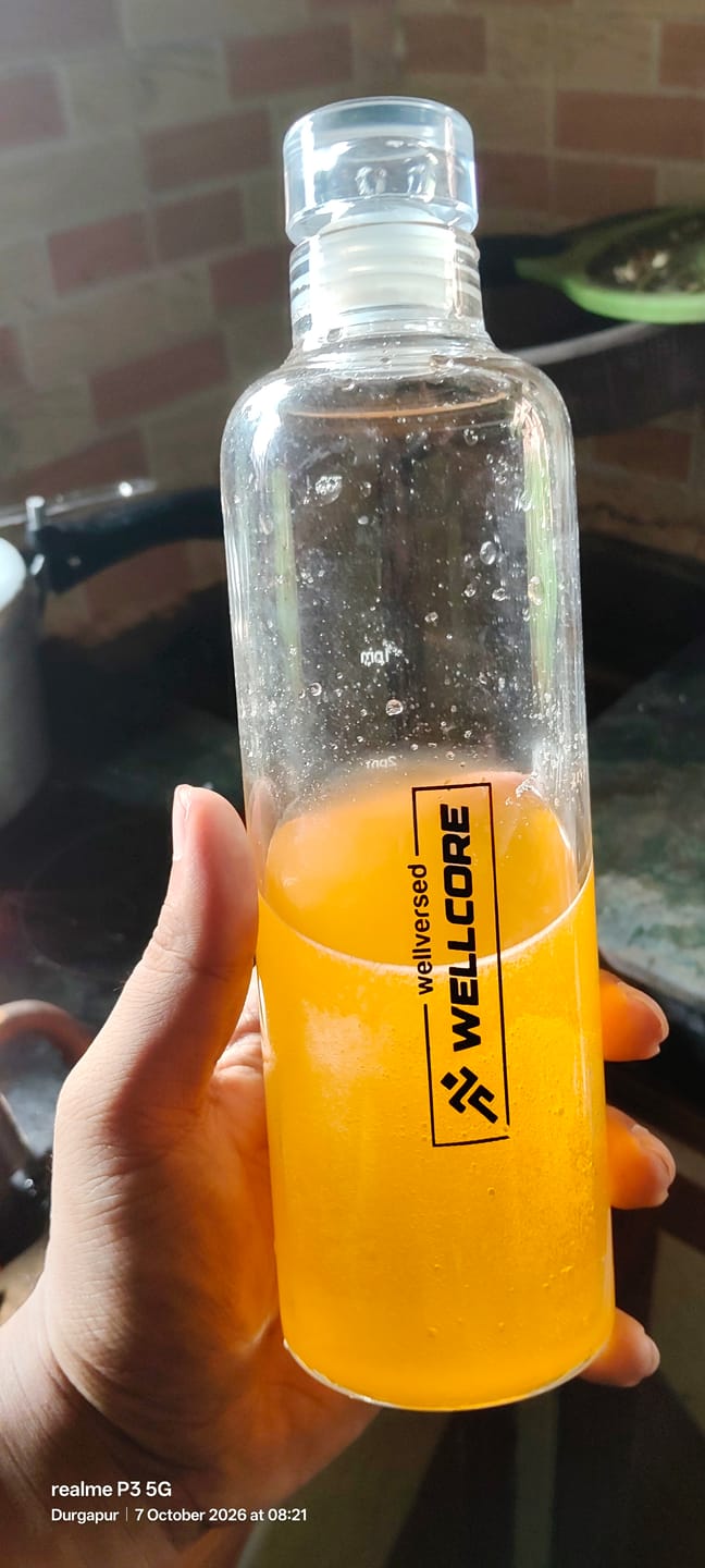 Customer photo review of Wellcore - Micronised Creatine Monohydrate (83 Servings, Tropical Tango) + Premium Glass Bottle