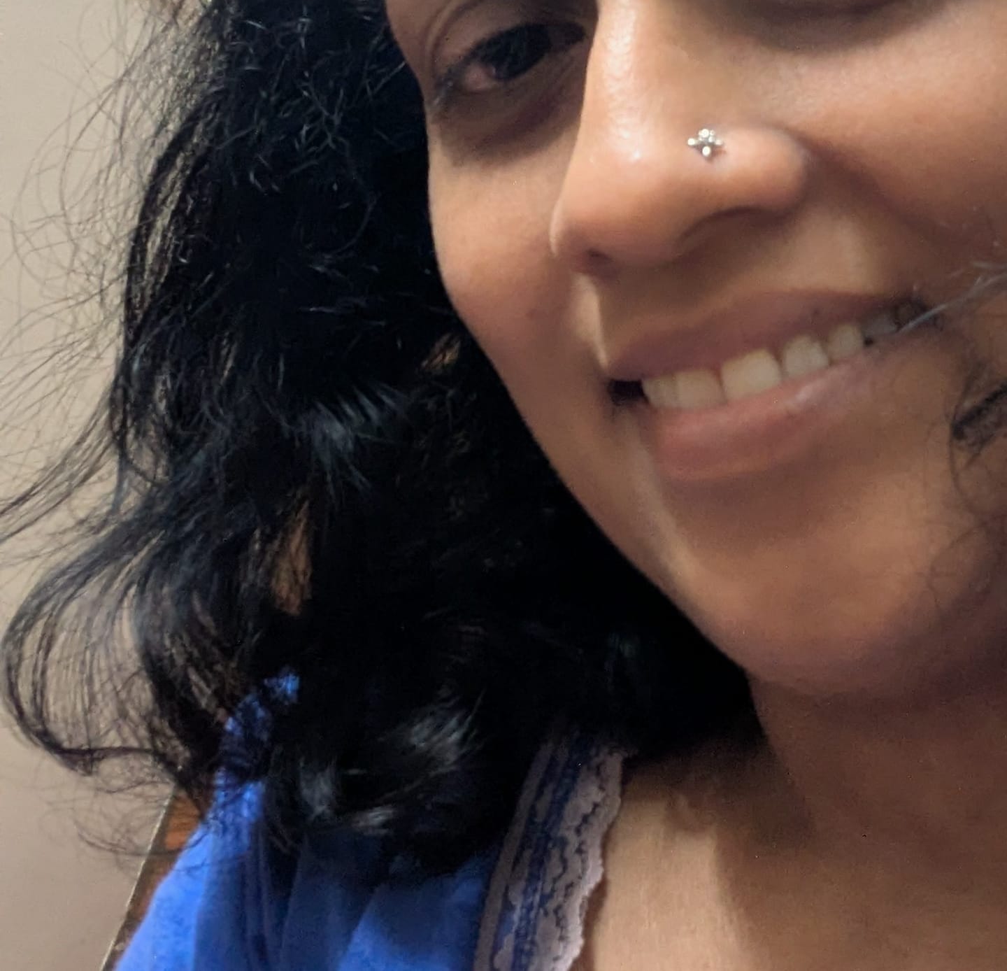 Customer photo review of Graceful Cross Screw Nose Pin