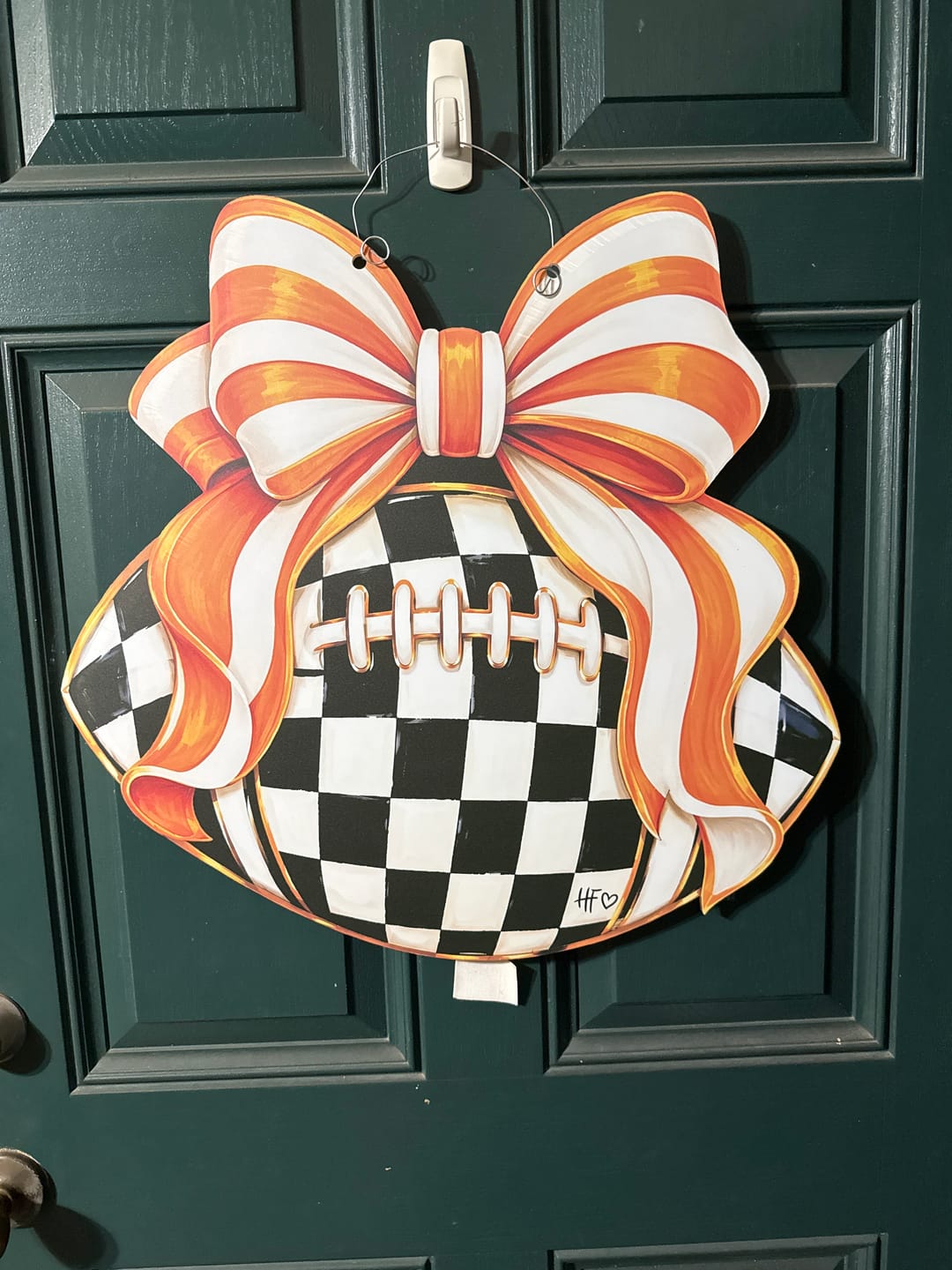 Customer photo review of Checkered Football Bows Orange White Door Hanger