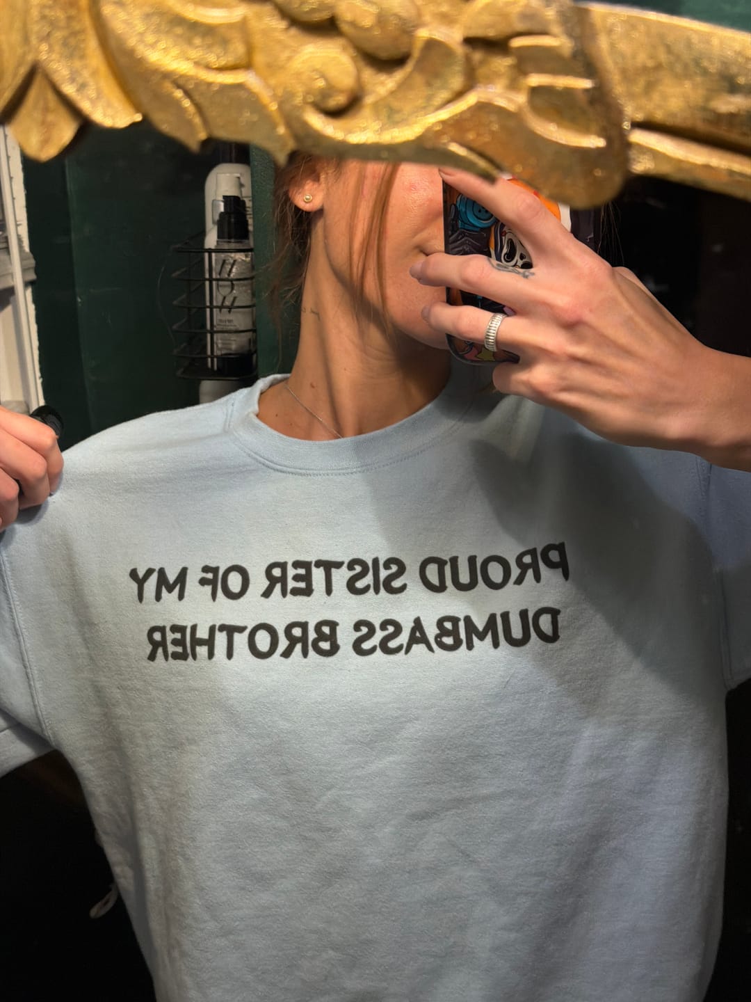 Customer photo review of Proud Sister of My Dumbass Brother Sweatshirt