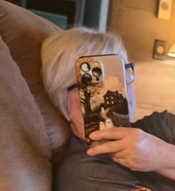 Customer photo review of The Haunted Cottage – Painterly Halloween Design iPhone Case