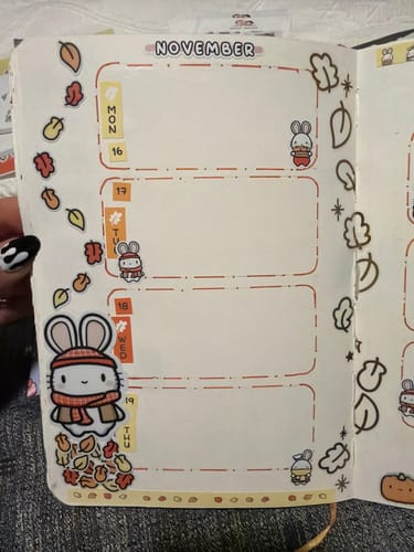 Customer's planner spread using Autumn Bunnies stickers to mark November days with leaf borders.