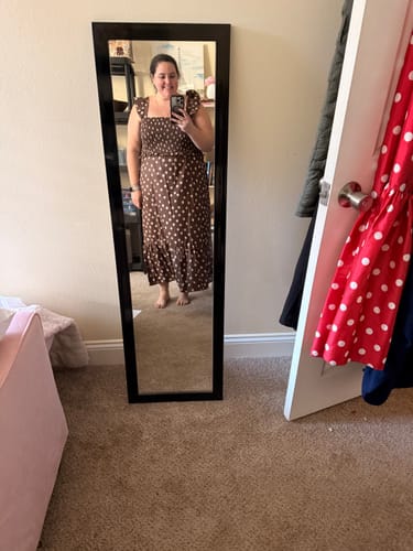 Customer's mirror selfie wearing the mocha Polka Dot Midi Dress with ruffle straps, showing the smocked bodice and fit.