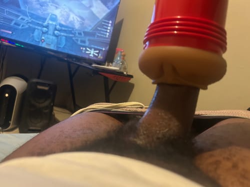 Customer's Kira Noir Ricky's Room Fleshlight being used, featuring a red case, in a room setting.