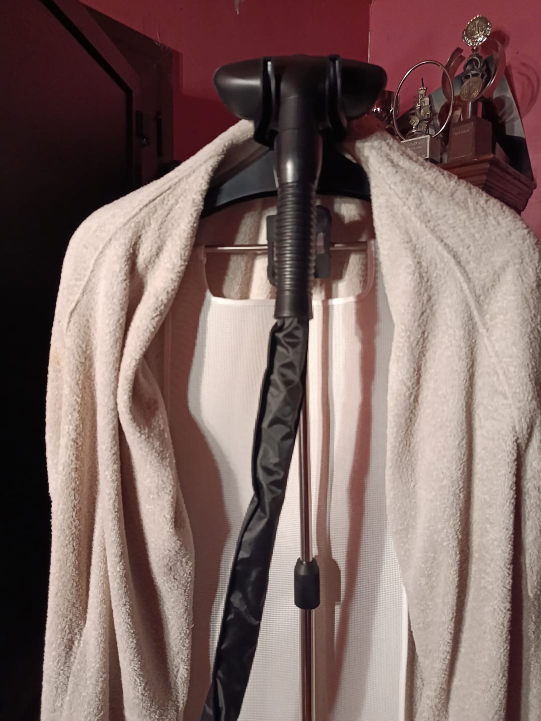Customer photo review of Flexible Ironing Board with Clothes Hanger and Pegs