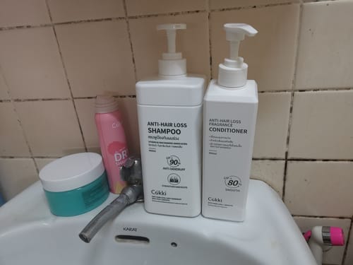 Customer photo review of แชมพูแก้ผมร่วงและดรายแชมพู