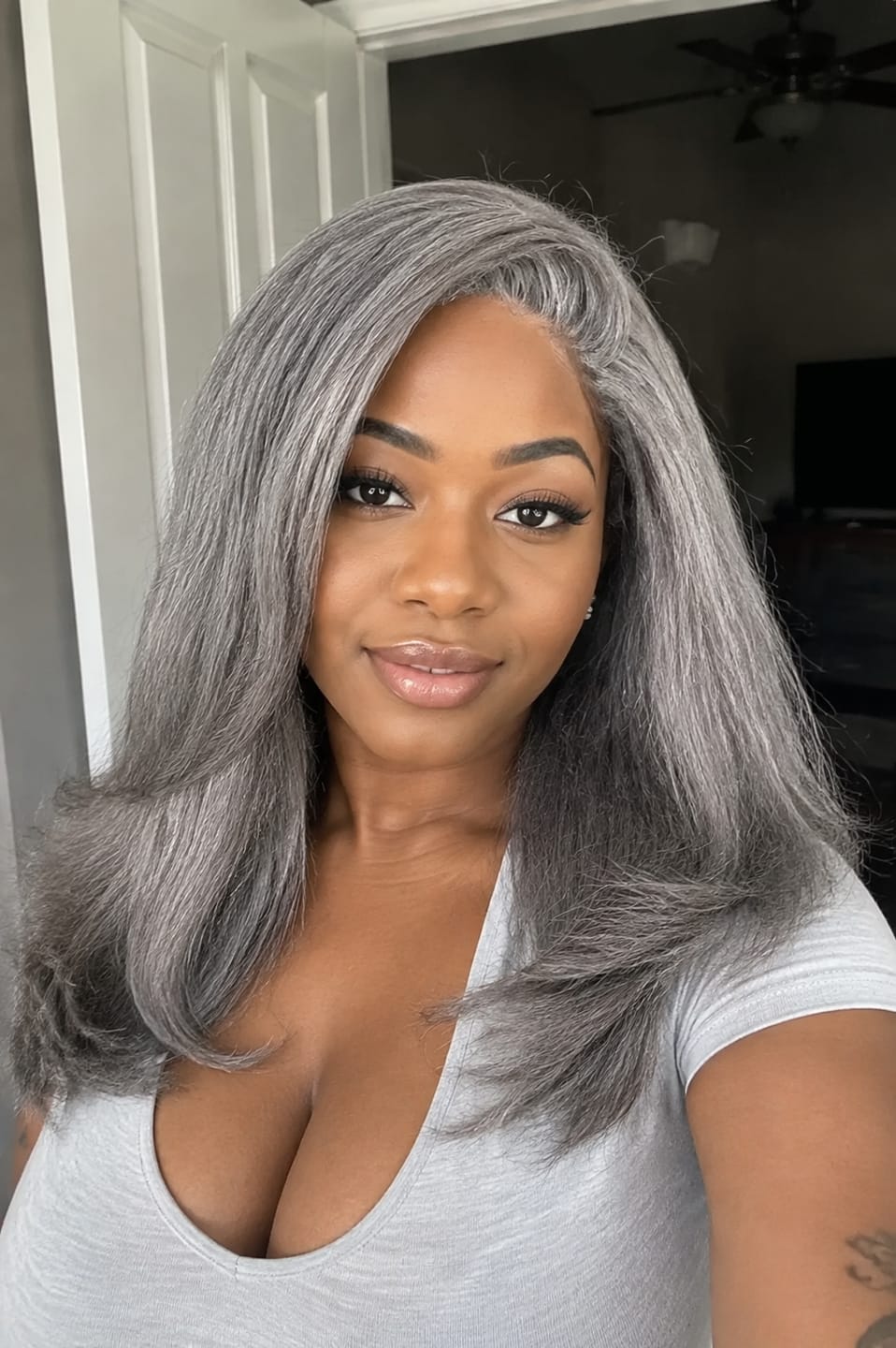 Customer photo review of Luvwin Kinky Straight Wavy Layered Style Gray Color Salt And Pepper Hair 5x5 Closure Wig