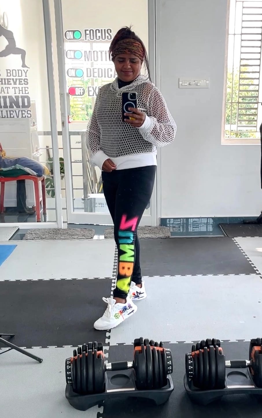 Customer photo review of Electric Feel High Waisted Ankle Leggings - Bold Black