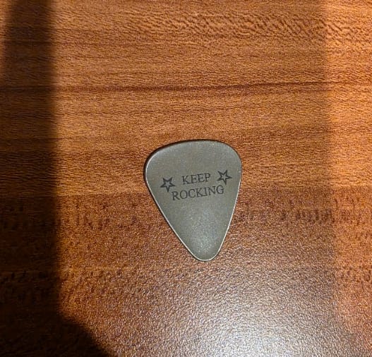 Customer photo review of Personalized Guitar Pick, Custom Engraved Stainless Steel Gift for Musicians