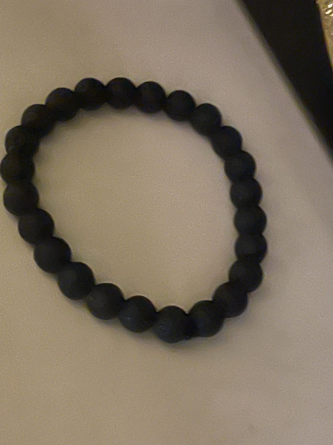 Customer photo review of Natural Volcanic Lava Bracelet | Vastu Remedy for Rebirth, Energy & Emotional Balance | 8 mm Beads