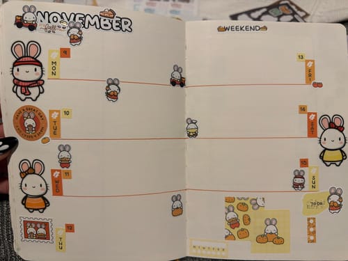 Customer's Autumn Bunnies Variety Sticker Pack decorating an open journal planner for November.
