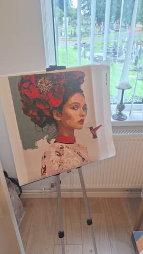 Customer's painted canvas on an easel, showing the precision possible with the Pink Premium Paint Brush Set.