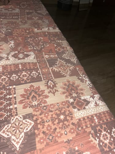 Customer's Flo Anti-Gravity Mattress with a patterned brown and tan fabric cover.