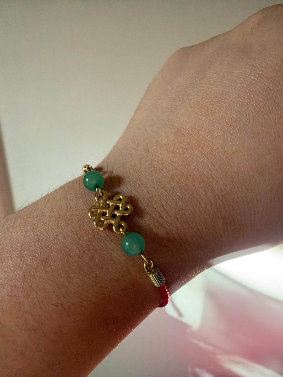 Customer photo review of Red String Jade Knot Bracelet