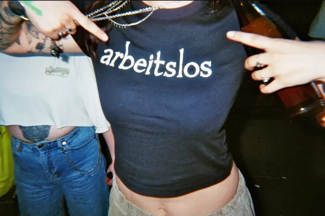 Customer photo review of arbeitslos Baby Tee
