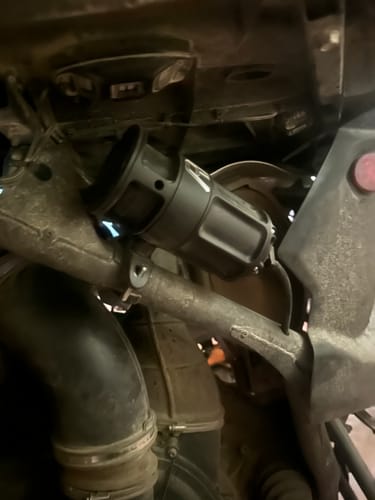 Customer's black RPM Can-Am X3 4-Stage Oil Catch Can installed on a UTV frame.
