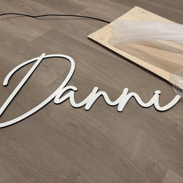 Customer photo review of Personalized Wooden Name Sign with LIVE PREVIEW