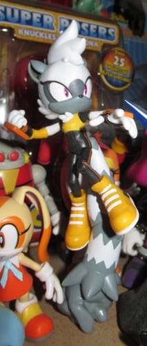Customer's Tangle the Lemur action figure standing with its long gray tail against other Sonic character figures.