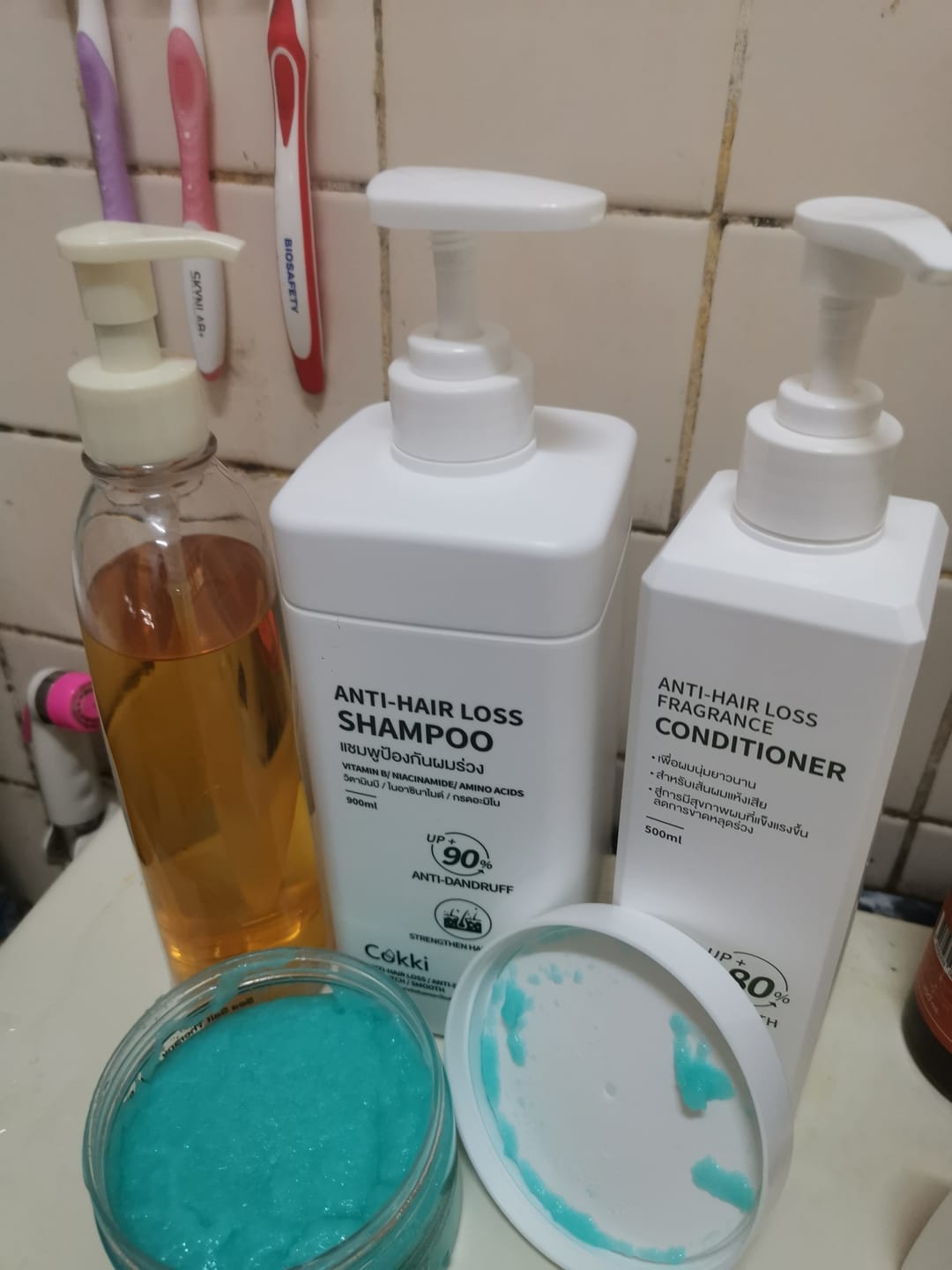 Customer photo review of ครีมนวดผมสูตรลดผมร่วง มีกลิ่นหอม 500 มล.