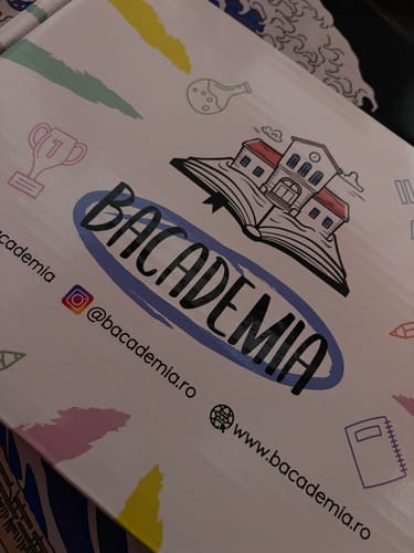 Customer's Bacademia Bacalaureat package featuring an illustrated school building logo.